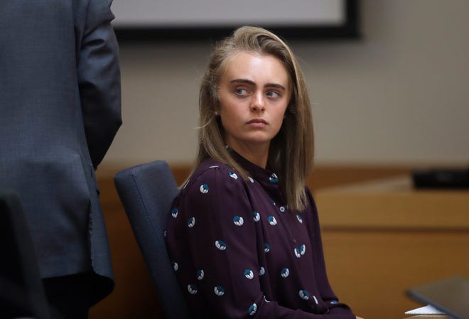FILE - In this June 8, 2017 file photo, Michelle Carter sits in Taunton District Court in Taunton, Mass. Carter was convicted of involuntary manslaughter and sentenced to prison for encouraging 18-year-old Conrad Roy, III to kill himself in July 2014. The Supreme Judicial Court of Massachusetts is expected to release it's ruling in the case on Wednesday, Feb. 6, 2019. Her sentence was put on hold while the court reviewed the case and the defense argument that her actions were not criminal. (AP Photo/Charles Krupa, Pool, File)