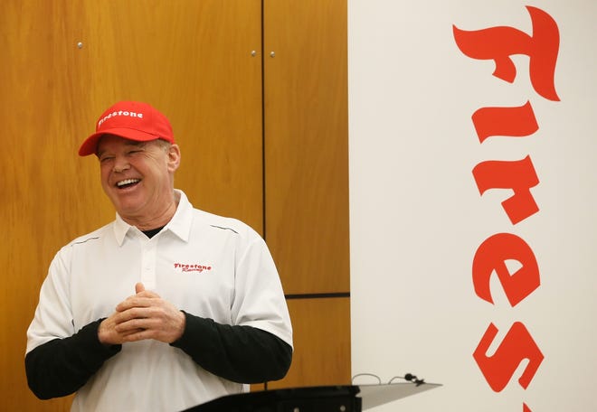Two-time Indy 500 winner Al Unser Jr. laughs at a comment as he talks about Firestone racing tires during a news conference to announce the building of a race tire facility called the Bridgestone Advanced Tire Production Center at the Bridgestone Americas Technical Center on Wednesday, Feb. 6, 2019 in Akron, Ohio. (GateHouse Ohio Media / Mike Cardew, BeaconJournal/Ohio.com)