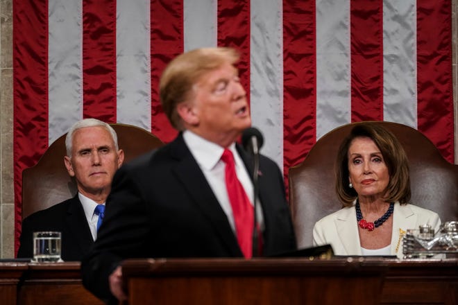 President Donald Trump gives his State of the Union address to a joint session of Congress on Tuesday, Feb. 5, 2019, at the Capitol in Washington, as Vice President Mike Pence, left, and House Speaker Nancy Pelosi look on. [Doug Mills/The New York Times via AP]