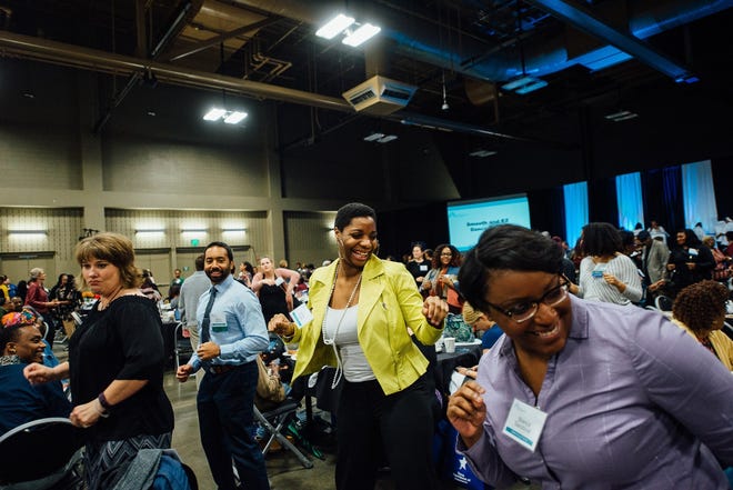 Attendees at the African American Family Support Conference participate in a workshop last year. [Photo by African American Family Support Conference]