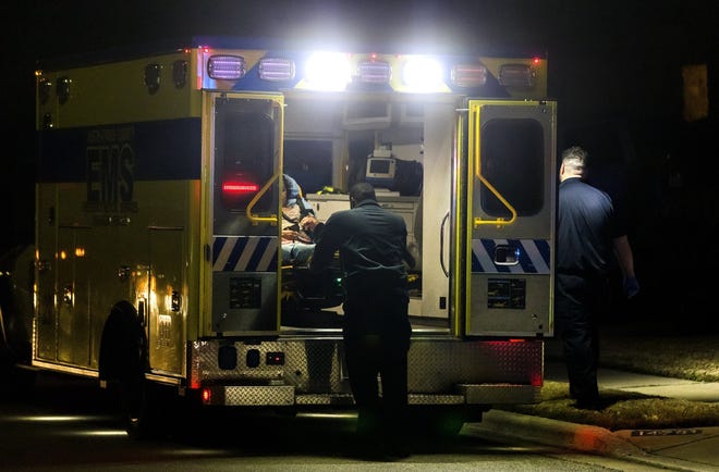 Austin-Travis County EMS medics tend to a woman in Pflugerville on Jan. 10. An American-Statesman analysis found that Travis County ambulances have failed to meet response-time goals for years when responding to calls outside Austin. [RICARDO B. BRAZZIELL/AMERICAN-STATESMAN]