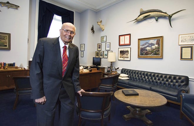 In a Feb. 4, 2009, file photo, Rep. John Dingell, D-Mich., poses for a photograph inside his office in House Rayburn Office Building on Capitol Hill in Washington. Dingell, the longest-serving member of Congress in American history who mastered legislative deal-making and was fiercely protective of Detroit's auto industry, died at age 92. Dingell, who served in the U.S. House for 59 years before retiring in 2014, died Thursday at his home in Dearborn, said his wife, Congresswoman Debbie Dingell. [MANUEL BALCE CENETA/ASSOCIATED PRESS]