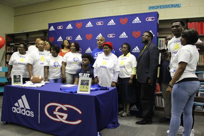 Congrats goes to Greene Central footall star A. J. Dupree for signing onto play for the NC A&T Aggies. [Laieke Abebe/Free Press]