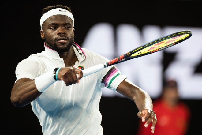 Frances Tiafoe, shown in action against Rafael Nadal at the Australian Open in Melbourne last month, likely will be seeded fourth at The Delray Open as he attempts to defend his title. [ASANKA BRENDON RATNAYAKE/The New York Times]
