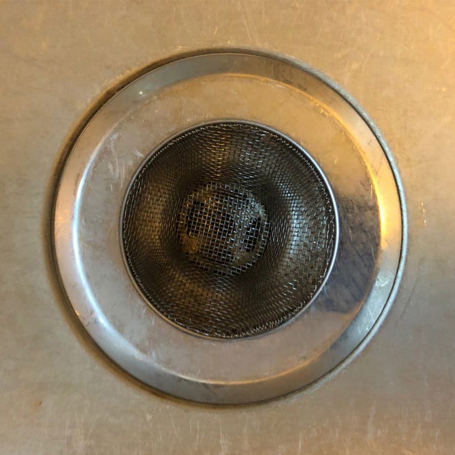 A sink strainer is the best way to keep food scraps and any associated fats, oils, and grease (FOG) from going down your drain. [RIRRC]