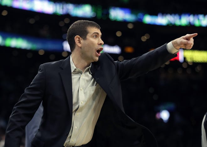 Boston Celtics head coach Brad Stevens instructs his team in the fourth quarter of an NBA basketball game against the Los Angeles Lakers, Thursday, Feb. 7, 2019, in Boston. The Lakers won 129-128. (AP Photo/Elise Amendola)