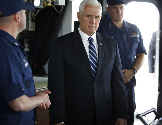 Vice President Mike Pence takes a tour of the Coast Guard Cutter Bear on Wednesday in Portsmouth, Va. [Stephen M. Katz/Virginian Pilot/TNS]