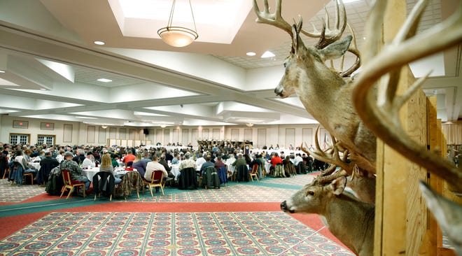 Hunters gather in the Convocation Center at Ashland University for the Buckeye Big Buck Club's 60th annual banquet and awards ceremony Saturday.