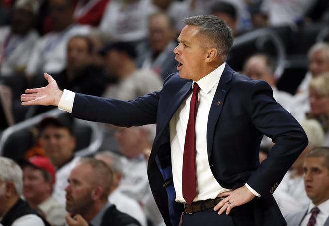 Ohio State Buckeyes head coach Chris Holtmann motions to his players during the second half of the NCAA basketball game against the Cincinnati Bearcats at Fifth Third Arena in Cincinnati on Nov. 7, 2018. Ohio State won 64-56. [Adam Cairns]