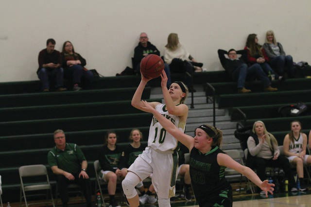 Emma Anderson goes up for a shot during a home game earlier this season. PHOTO BY ANDREW BROWN/THE PERRY CHIEF