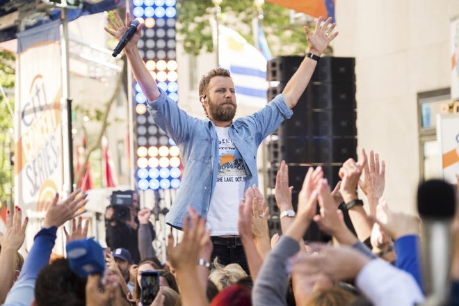 FILE - In this June 12, 2018 file photo, Dierks Bentley performs on NBC's "Today" show at Rockefeller Plaza in New York. Bentley performed at the CMA Festival last weekend and released a new album, "The Mountain." (Photo by Charles Sykes/Invision/AP, File)