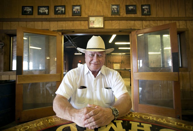 Rick Schmidt sits at his table at Kreuz Market on Colorado Street in Lockhard in 2014.  [JAY JANNER/AMERICAN-STATESMAN]