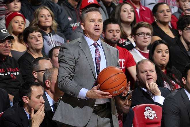 Ohio State Head Coach Chris Holtmann holds the ball that was thrown out of bounds in the second half during the game against High Point Panthers at Value City Arena in Columbus on December 29, 2018. [Samantha Madar/Dispatch]