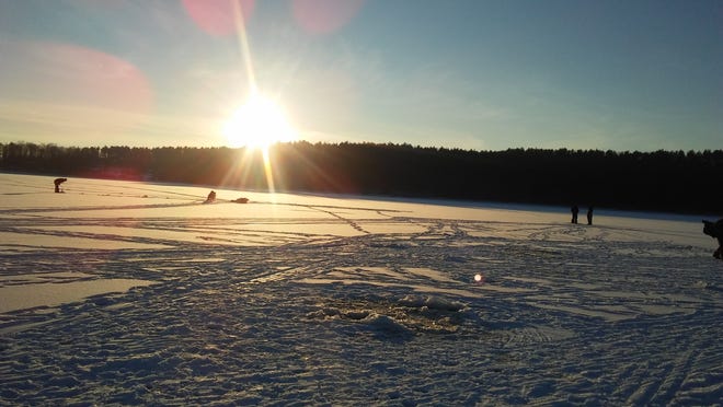 There is always plenty to do in the great outdoors throughout the Tuscarawas Valley. Jeff Coventry of Dover went ice fishing on Feb. 2. He snapped this shot of the sun setting over Atwood Lake as some other fishermen were hoping to pull in some fish. Coventry said there were quite a few people fishing.