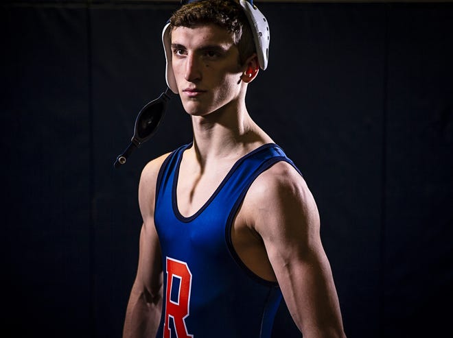 Rochester High School senior wrestler Mason Ross is making his first state tournament appearance in the 138-pound weight class after finishing second the Class 2A Mahomet-Seymour Sectional and currently has the record for most career wins in school history with 121. [Justin L. Fowler/The State Journal-Register]