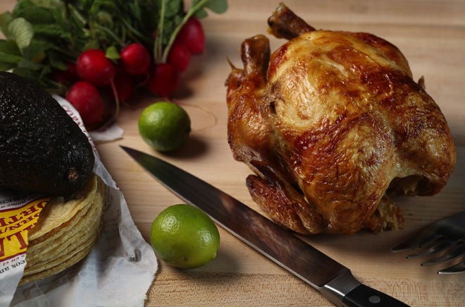 A supermarket rotisserie chicken can yield enough meat to make two taco dinners. [Abel Uribe/Chicago Tribune/TNS]
