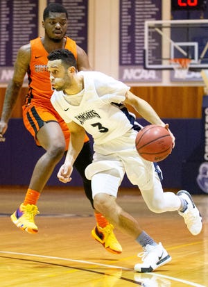 Geneseo State junior guard Terry Nichols (3), the former high school star from New York Mills, was named the SUNYAC Men's Basketball Player of the Week after his late-game heroics led the Knights to a 77-76 win over Brockport State over the weekend. He is leading Geneseo in scoring at 16.4 points per game. [KEITH WALTER / SUNY GENESEO]