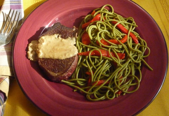 Beef Tenderloin Gorgonzola with Spaghetti and Sweet Pimentos. [Linda Gassenheimer/TNS]