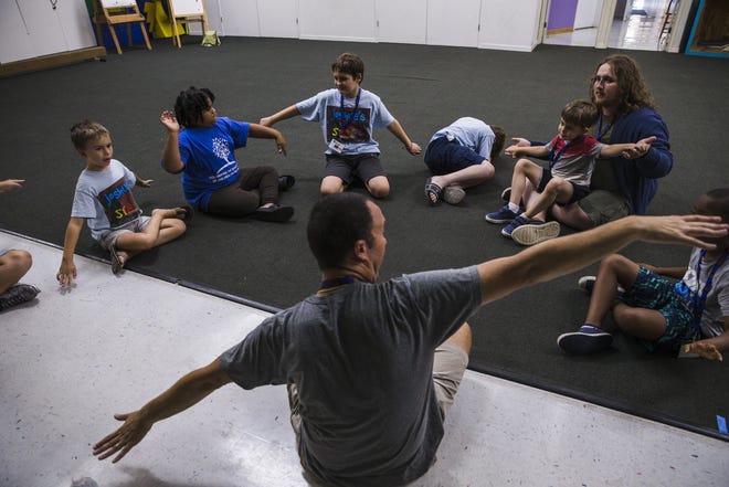 Executive Director Joshua Levy engages campers in dramatic exercises during Joshua's Stage camp. [AMERICAN-STATESMAN 2018]