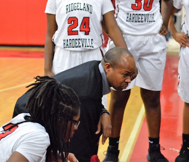 Coach Frederick Toomer and Ridgeland-Hardeeville's girls basketball team's season ended Thursday when the visiting Jaguars lost 40-30 to Swansea in the second round of the SCHSL Class AAA state playoffs. [Janine Wilson/Special to JCST]