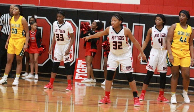 Quinntryce Bell (No. 32) had 20 points in Donaldsonville's 67-46 first-round win over Green Oaks. Photo by Kyle Riviere.