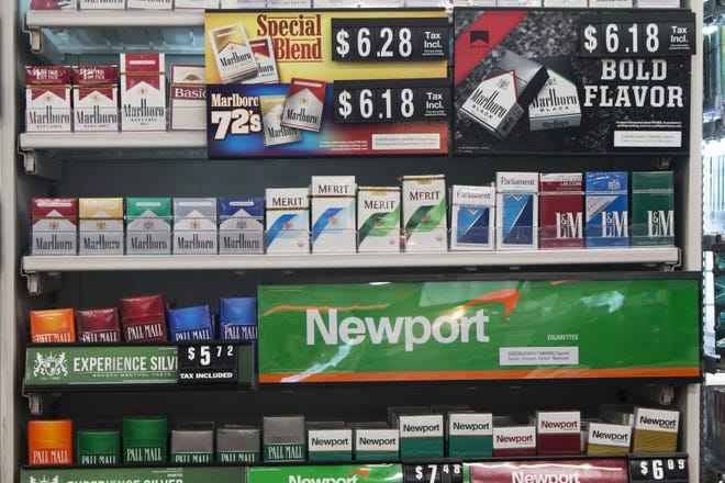 As advocates push to raise the legal age to buy tobacco products to 21 statewide, they point to some Illinois cities that have already done that. (AP Photo/Bobby Caina Calvan)