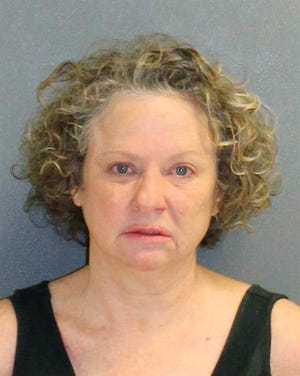 This Friday Feb. 8, 2019, booking photo made available by the Volusia County, Fla., Sheriff's Office, shows Julie Andrews, who was stopped by a deputy on suspicion of drunk driving. The deputy who is black said Andrews would have the Ku Klux Klan burn crosses on his property. The arrest report says Edwards smelled of alcohol, had slurred speech and was unsteady on her feet. (Volusia County Sheriff's Office via AP)
