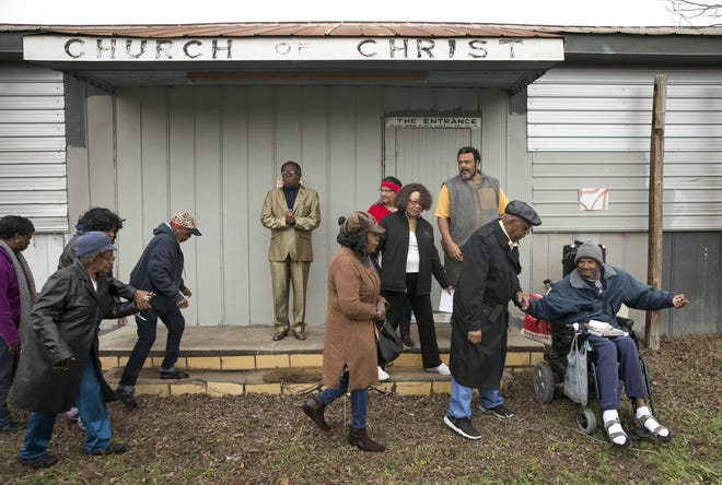 Former students of the Montopolis Negro School gather Saturday for a celebration after the city of Austin preserved the building by purchasing it through eminent domain. For more than two years, activists worked to save the historic building, which was once set for demolition by the land's previous owner. [JAY JANNER/AMERICAN-STATESMAN]