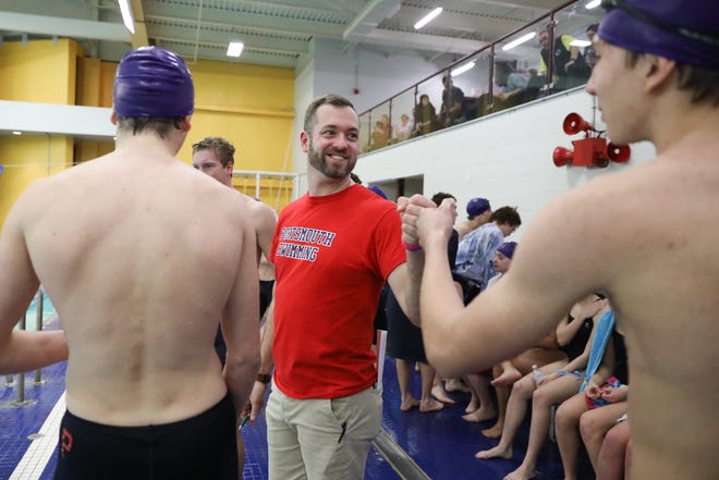 Portsmouth swim coach Evan Denard and the Patriots won the Division II championship on Saturday. [DAILY NEWS FILE PHOTO]