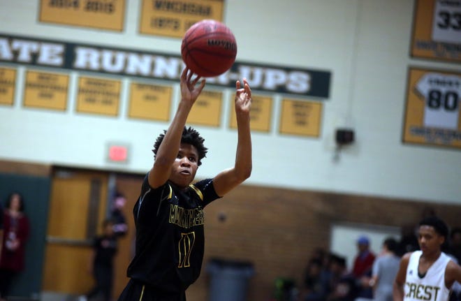 Kings Mountain's Isaiah Tate shoots a free throw during a recent game against Crest. [Brittany Randolph/The Star]