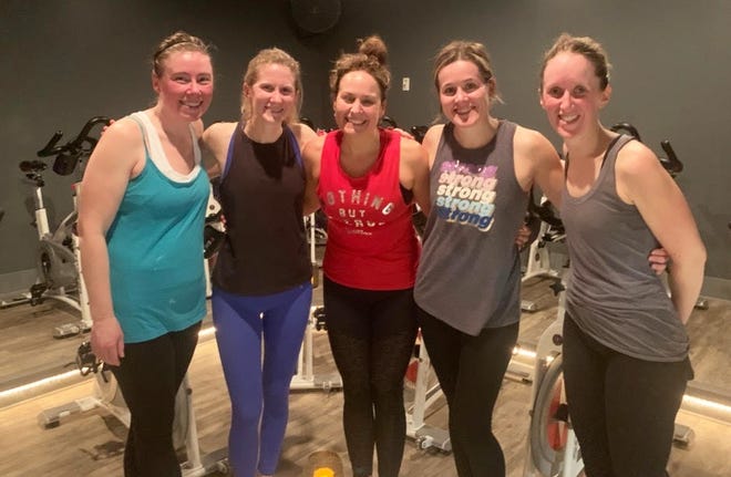 Dondero Playground Committee organizers, from left, Laura Kennedy, Ashley Parsons, Amber Buttermore, Sarah Lynch, and Morgen Healy take part in a fundraiser at Cycle Fierce in Portsmouth. [Courtesy]