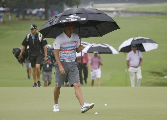 Rickie Fowler wears shorts during a PGA Championship practice round at Quail Hollow in Charlotte, N.C., in 2017. The PGA Tour is allowing shorts in practice rounds and pro-ams beginning this week. [Chris Carlson/AP]