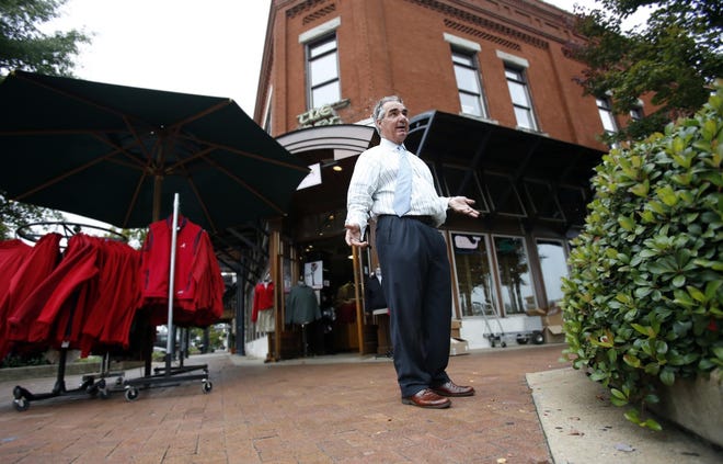 Charles Spurlin, pictured here in 2013, said holiday sales at his downtown business, The Shirt Shop, were good this past November and December. Both Tuscaloosa and the state saw increases in taxed holiday sales in 2018 over 2017, reports said. [Staff file photo]