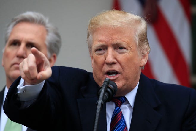 President Donald Trump speaks in the Rose Garden of the White House in Washington, joined by House Minority Leader Kevin McCarthy of Calif., and other Congressional Republican leaders, after a meeting with Congressional leaders on border security, as the government shutdown continues Friday, Jan. 4, 2019. (AP Photo/Manuel Balce Ceneta)