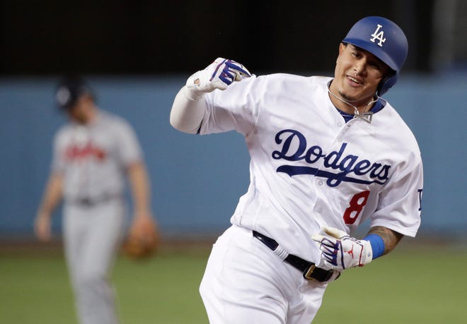 Manny Machado has agreed to a $300 million, 10-year deal with the rebuilding San Diego Padres, the biggest contract ever for a free agent. The agreement is subject to a successful physical. [Jae C. Hong/The Associated Press]