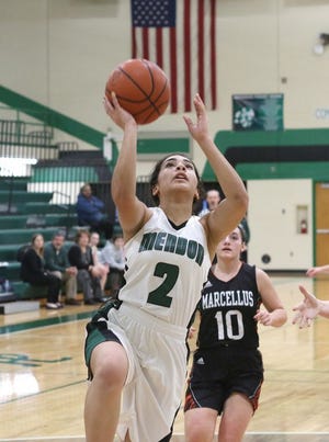 Mendon’s Amaijha Bailey goes up to score a pair of her 13 points Tuesday night.