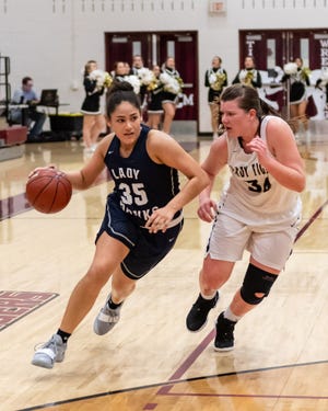 Kailey Lacy , No. 25, and the Hendrickson girls basketball tean will compete in this weekend's regional tournament [Henry Huey for American-Statesman.]