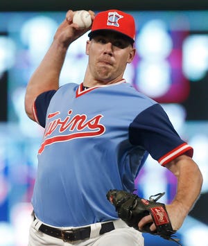 Trevor May is one of the closer options for the Minnesota Twins. [Jim Mone/The Associated Press]