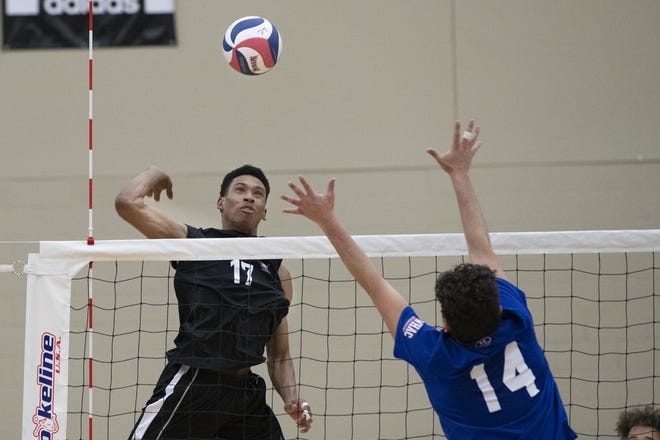 LC's Charles Carter swinging for a kill against Lawrence Tech. [Photo submitted]