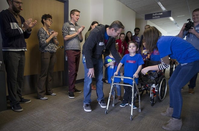Owen Coulter, 5, leaves the hospital after spending two months there. [RICARDO B. BRAZZIELL/AUSTIN AMERICAN-STATESMAN]