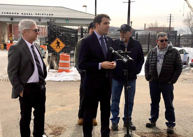 U.S. Rep. Chris Pappas, D-N.H., center, visited Portsmouth Naval Shipyard Wednesday to discuss the possible diversion of military construction funds to build the southern border wall. He was joined by union leaders. [Hadley Barndollar/Seacoastonline]