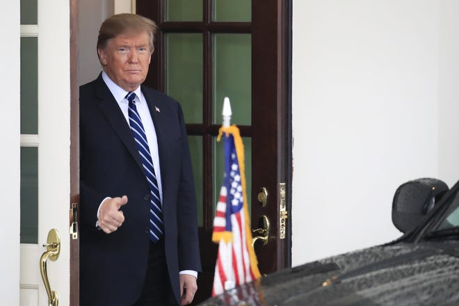 President Donald Trump gestures as visiting Austrian Chancellor Sebastian Kurz leaves the White House in Washington following their meeting Wednesday, Feb. 20. [Manuel Balce Ceneta/The Associated Press]
