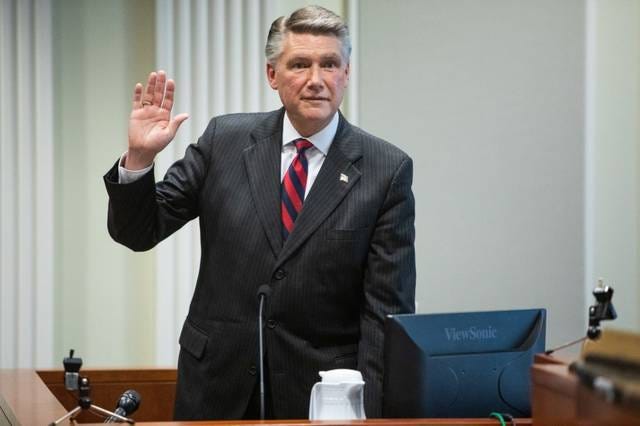 Mark Harris, Republican candidate in North Carolina’s 9th Congressional race, prepares to testify during the fourth day of a public evidentiary hearing on the 9th Congressional District voting irregularities investigation Thursday, Feb. 21, 2019, at the North Carolina State Bar in Raleigh. (News & Observer pool photo)