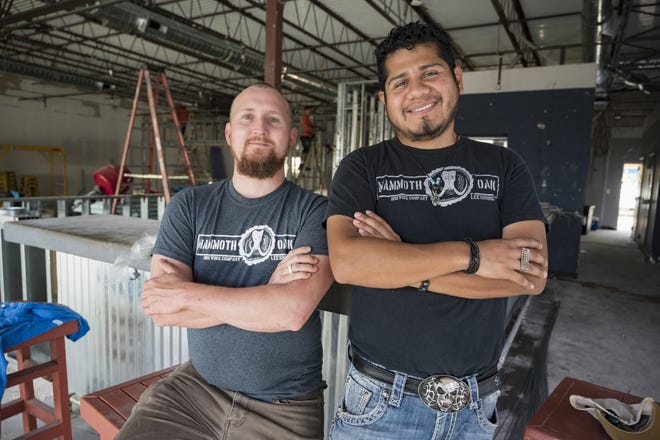 Lead brewer Isaac Johnson and co-founder A.C. Cisneros are rennovating the former 24 Tap Room in Leesburg to become Mammoth Oak Brewing Company. [Cindy Sharp/Correspondent]