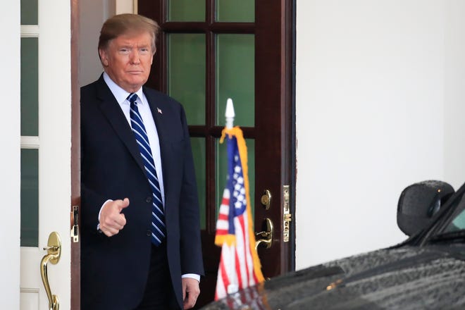 President Donald Trump gestures as visiting Austrian Chancellor Sebastian Kurz leaves the White House in Washington following their meeting, Wednesday, Feb. 20, 2019. (AP Photo/Manuel Balce Ceneta)