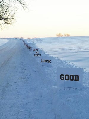 Burma Shave-style signage lined the driveway of the Schmidt property between Ames and Gilbert late last week, as a send-off to the many youth wrestlers who practice on this property in a place called, The Barn. The signs were made by a team dad, Brad Eslick of the Roland-Story area. Photo Contributed