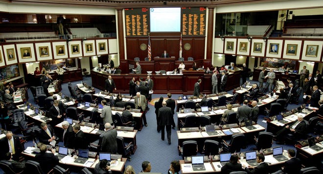 The Florida House of Representatives meets during the legislative session. [AP Photo/Phil Coale, File]