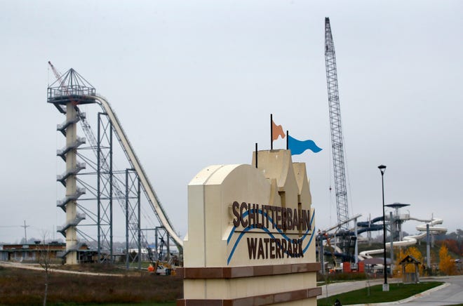 Crews dismantle the Verruckt waterslide at the Schlitterbahn water park in Kansas City, Kan., in October. A judge has dismissed criminal charges against the Kansas water park owner and the designer of a 17-story slide on which a 10-year-old boy was decapitated in 2016. [Charlie Riedel/Associated Press]