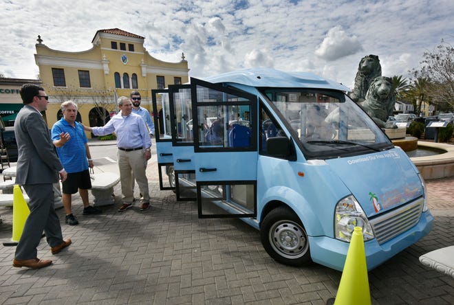 A Beachside Buggies electric bus is displayed at San Marco Square in Jacksonville. The company, which has a free ride service at the Beaches, is planning service to the San Marco area in late April. [Will Dickey/Florida Times-Union]