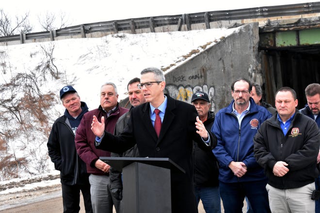 U.S. Rep Anthony Brindisi speaks about the need to bring more federal investment to New York for infrastructure projects while standing on Millers Grover Road in Schuyler, Friday, Feb. 22, 2019. [SAMANTHA MADISON / OBSERVER-DISPATCH]